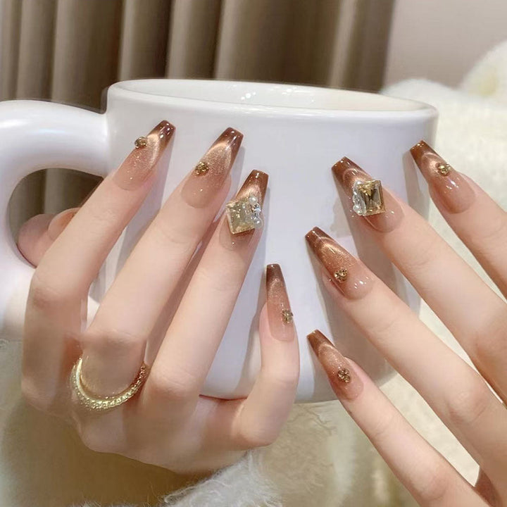 Artificial nails with elegant ombre effect and exquisite gemstones Kalsten