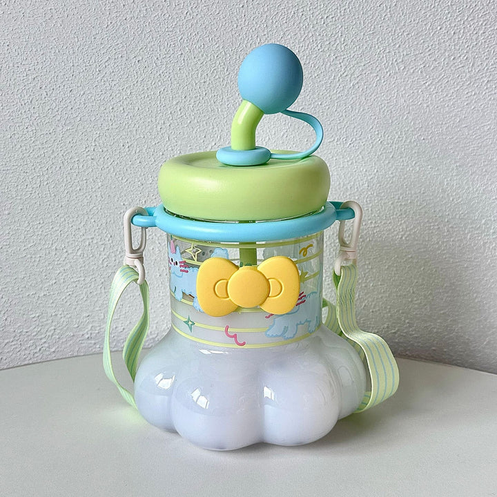Women's water bottle with integrated silicone carrying handle and playful design Kalsten