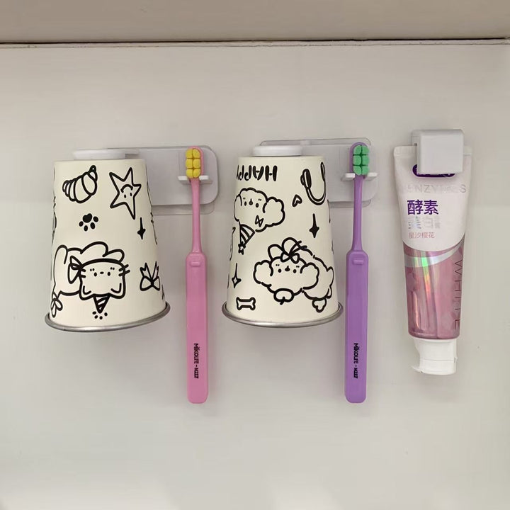 Wall-mounted toothbrush holder with playful animal design Kalsten