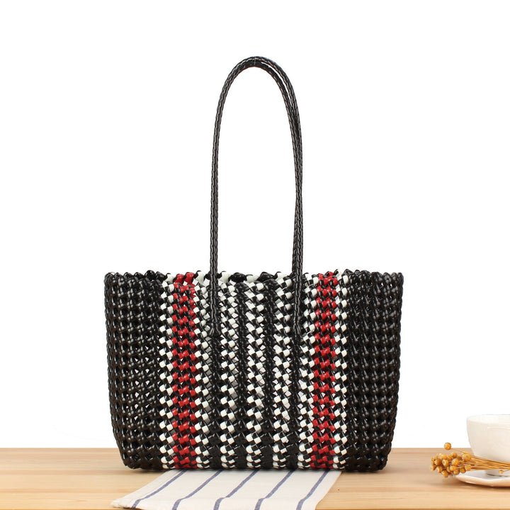 Stylish handbag made of braided material Kalsten