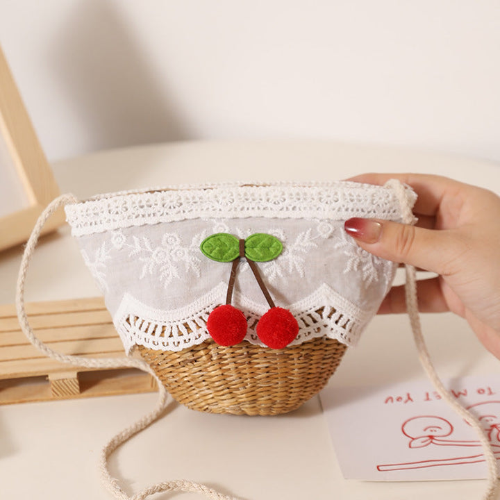 Playful straw shoulder bag with floral accents Kalsten