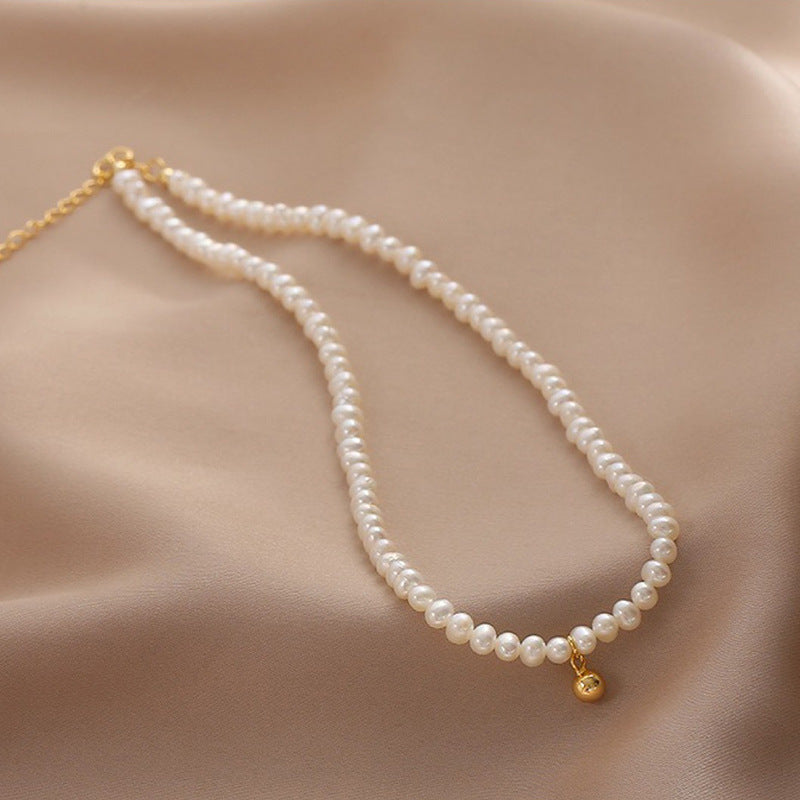 Delicate pearl necklace with elegant gold accent chain Kalsten