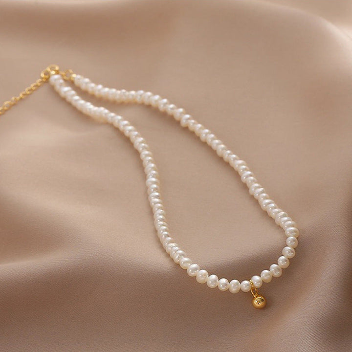 Delicate pearl necklace with elegant gold accent chain Kalsten