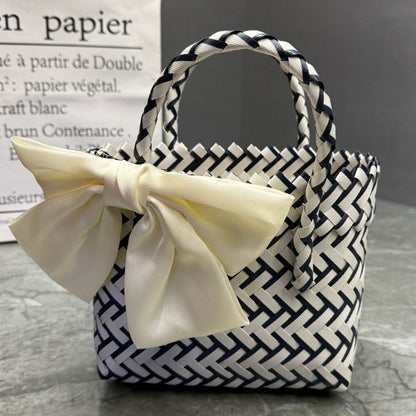 Playful basket bag with bow Acalora