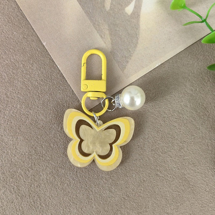 Keychain with butterfly and pearl accent Kalsten