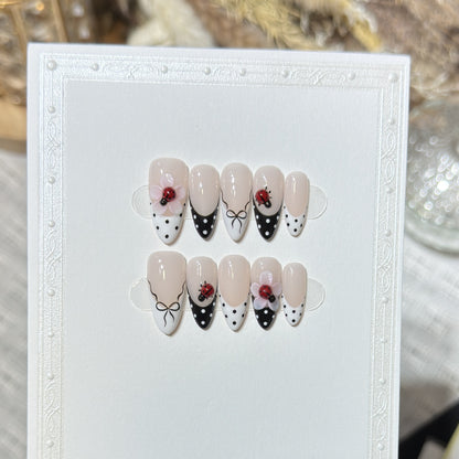 Artistic Stiletto Press-On Nail Set with Floral and Insect Designs Acalora