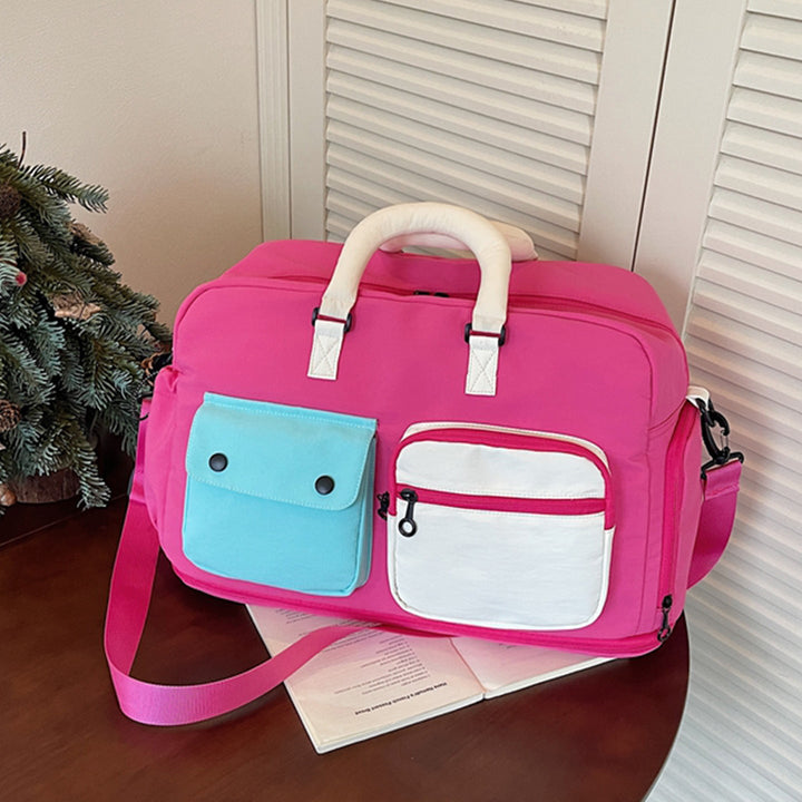 Sporty travel bag with multifunctional outer pockets Kalsten