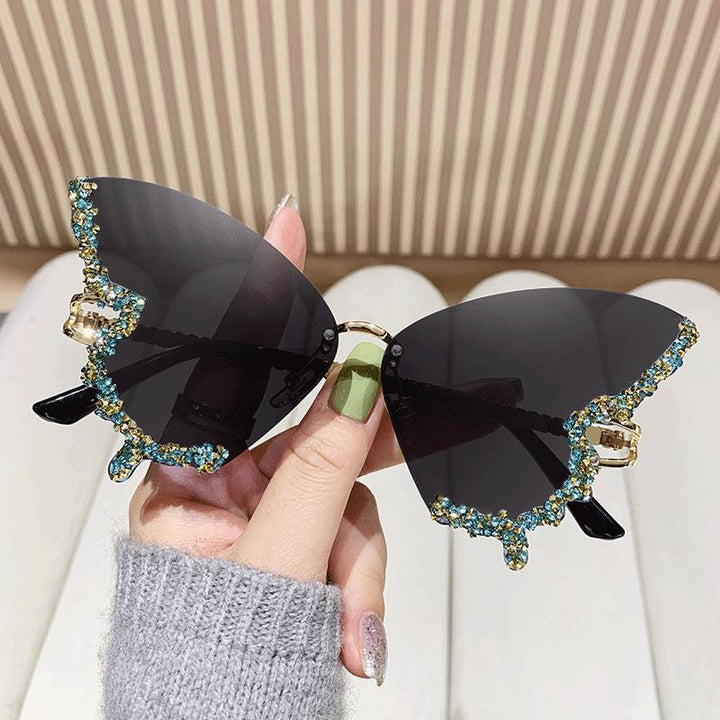 Women's extravagant sunglasses with sparkling butterfly design Kalsten