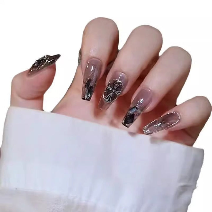 Glamorous artificial nails with heart design and glittering accents Kalsten