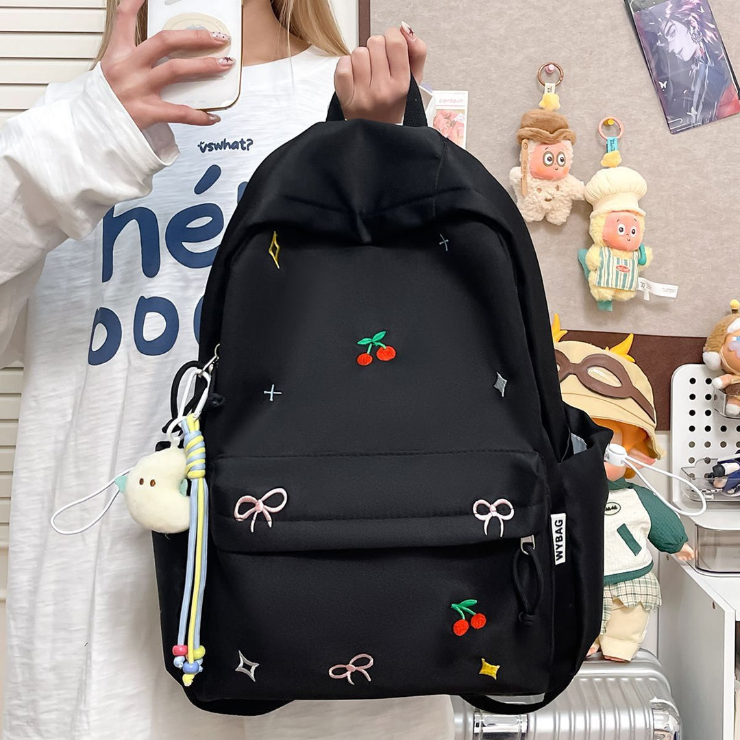 Playful backpack with embroidery Kalsten