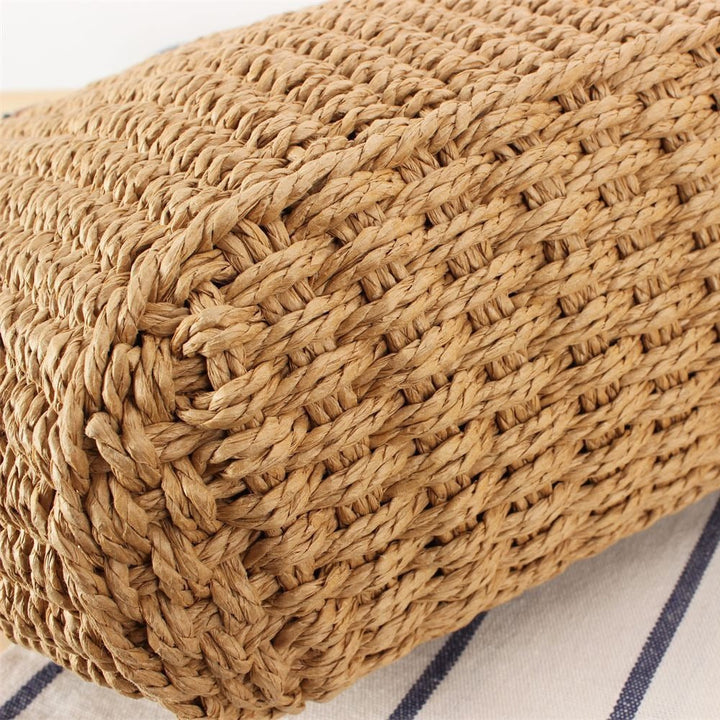 Beach bag made of handwoven natural material with sturdy leather straps Kalsten