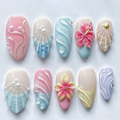 Artificial nail set with floral and shell-shaped designs Acalora