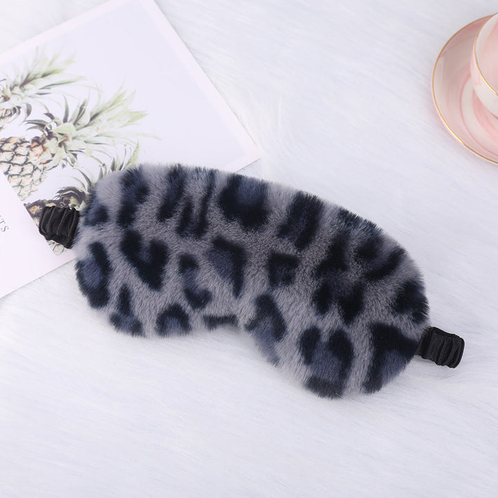 Women's cuddly faux fur sleep mask with heart-embossed surface and gathered comfort band Kalsten