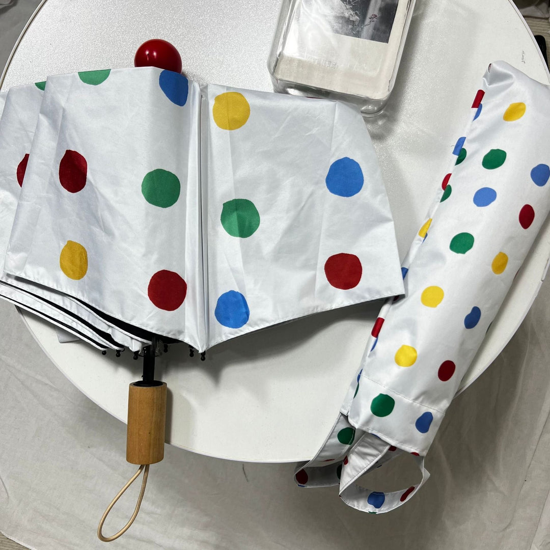 Ladies designer foldable umbrella with colorful polka dot pattern Kalsten