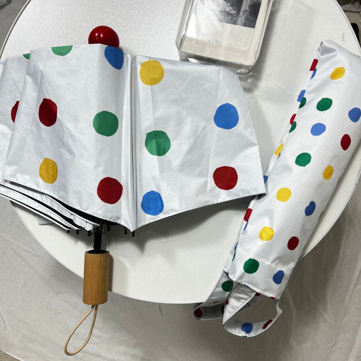 Ladies designer foldable umbrella with colorful polka dot pattern Kalsten