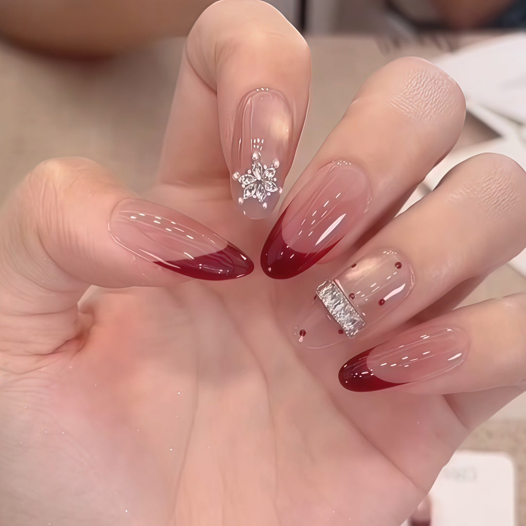 Artificial nails with festive design and rhinestone details Kalsten