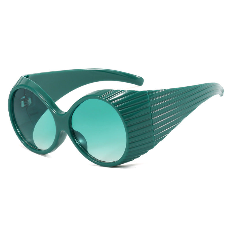 Women's extravagant sunglasses with curved frame Kalsten