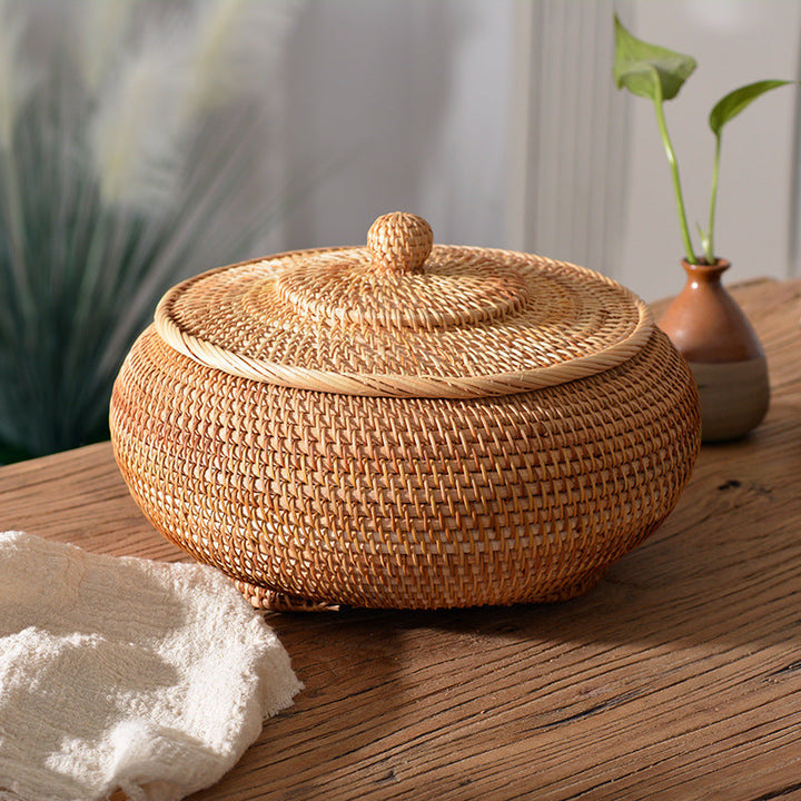 Women's round storage basket made of woven natural material Kalsten