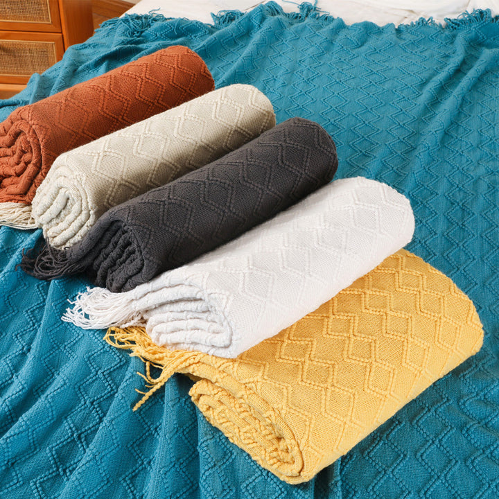 Ladies elegant and cozy knitted blanket with fringes Kalsten