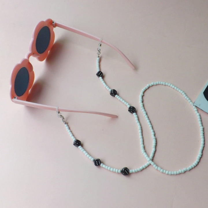 Sunglasses with fashionable pearl band Kalsten