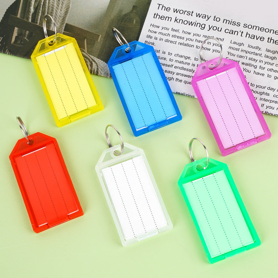 Unisex label tag with transparent sleeve and three writable fields Kalsten