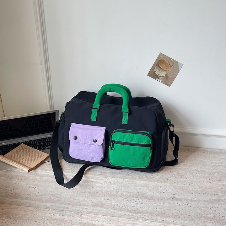 Sporty travel bag with multiple pockets and adjustable shoulder strap Kalsten
