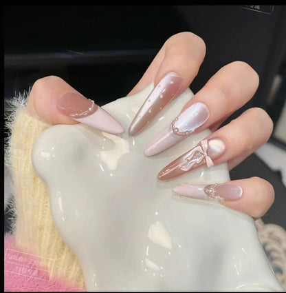 Glamorous artificial nail tips with elegant decorations Acalora