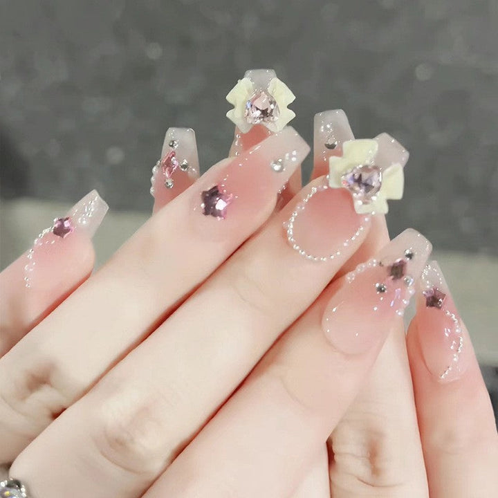 Glamorous artificial nails with moon and star motif Kalsten