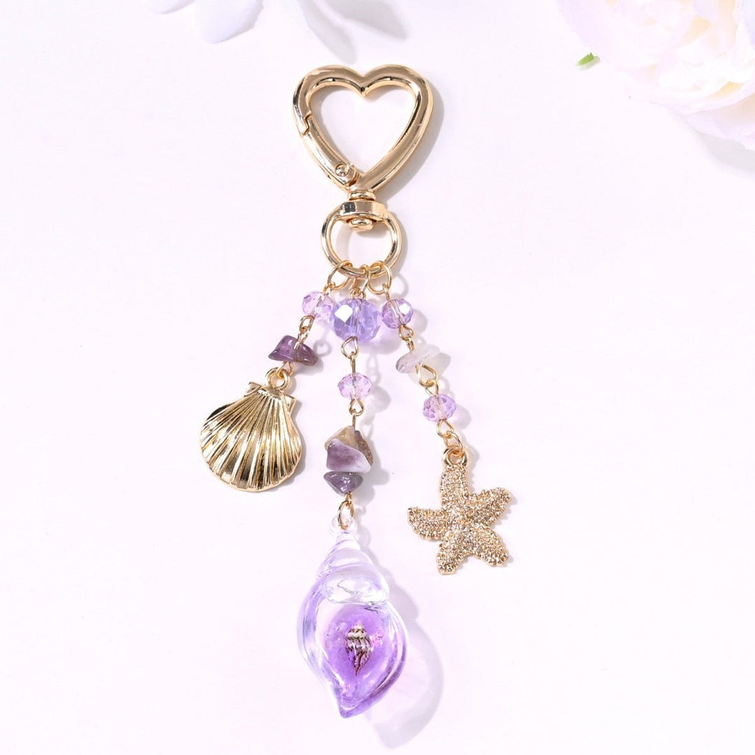 Keychain with Sparkling Sun Motif Kalsten
