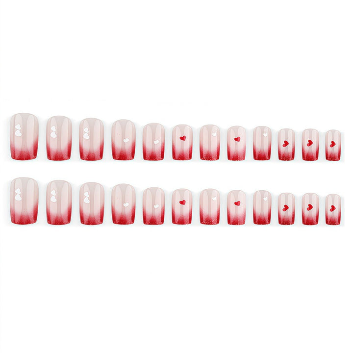 Romantic Nail Art with Heart Motifs Kalsten