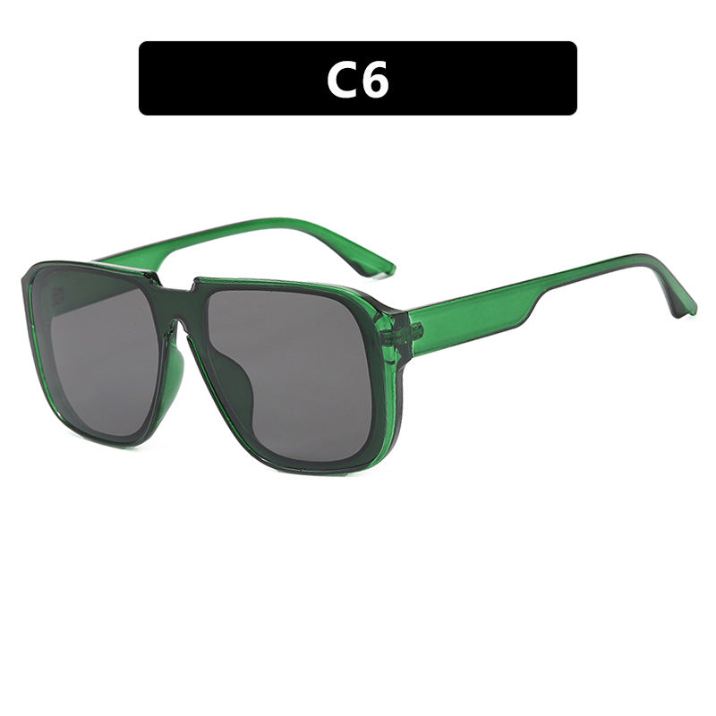 Ladies trendy square sunglasses with transparent green frame and protective UV filter Kalsten