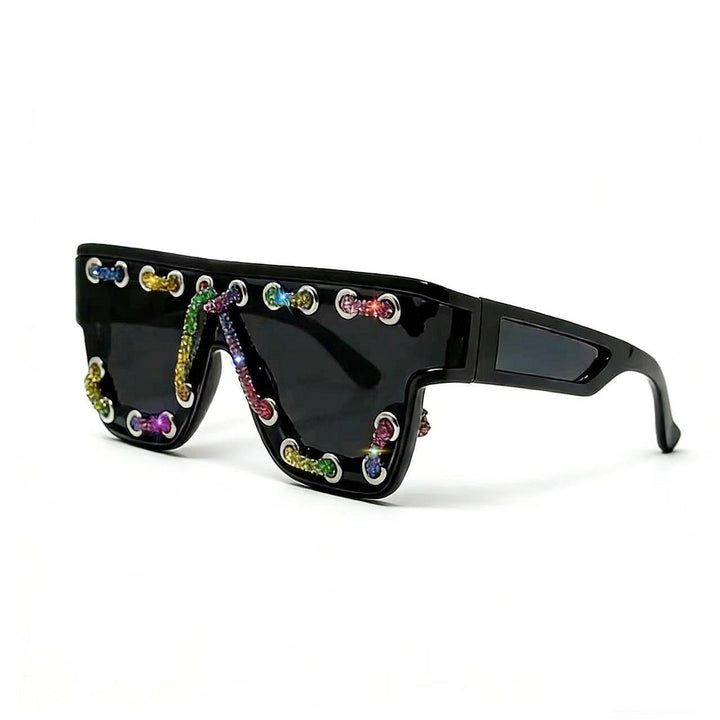 Ladies sunglasses with extravagant design and decorative chain embellishment Kalsten