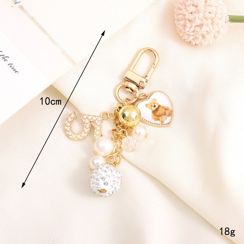 Playful keychain with teddy bear motif Kalsten
