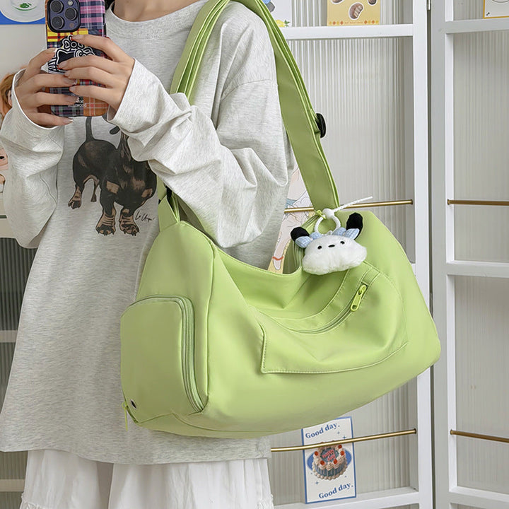 Sporty shoulder bag with spacious interior and sturdy carrying strap Kalsten