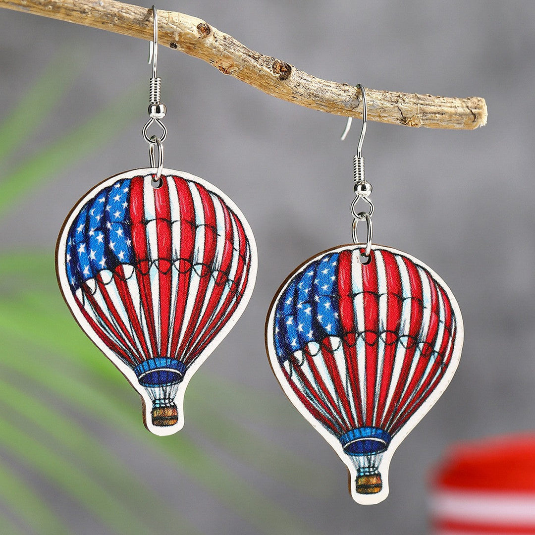 Ladies' lightweight wooden earrings in airplane jet design with patriotic motif and hypoallergenic fish hook Kalsten