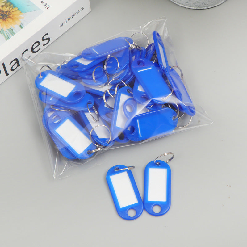 Unisex writable keychain with clear labeling field Kalsten