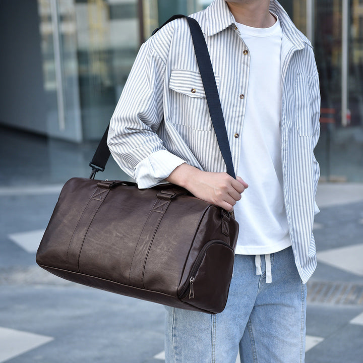 Travel bag made of high-quality leather with robust carrying handles Kalsten