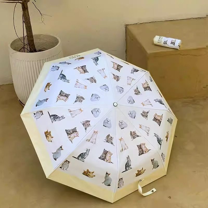 Ladies folding umbrella with playful animal design Kalsten