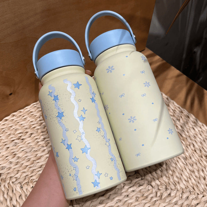 Women's insulated drinking bottle with practical carrying handle and cheerful design Kalsten