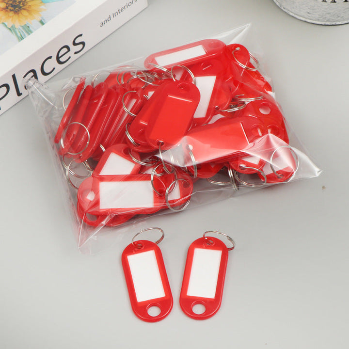 Unisex writable keychain with clear labeling field Kalsten