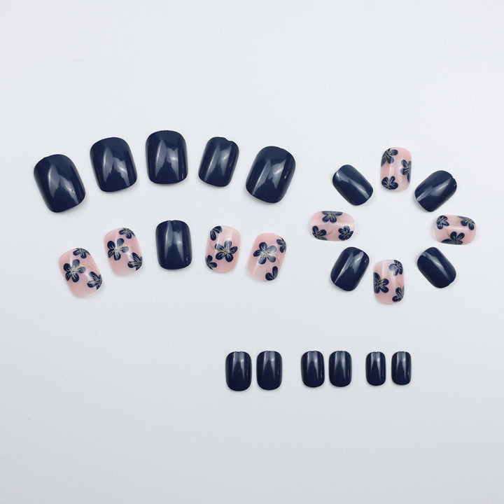 Artificial nails with floral designs and glossy accents Kalsten