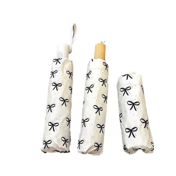 Women's foldable umbrella with elegant bow design Kalsten