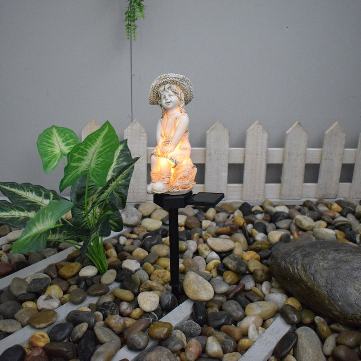 Decorative Solar Garden Stake Statue Resin Girl Figurine With Integrated Solar LED And Weatherproof Spike Kalsten