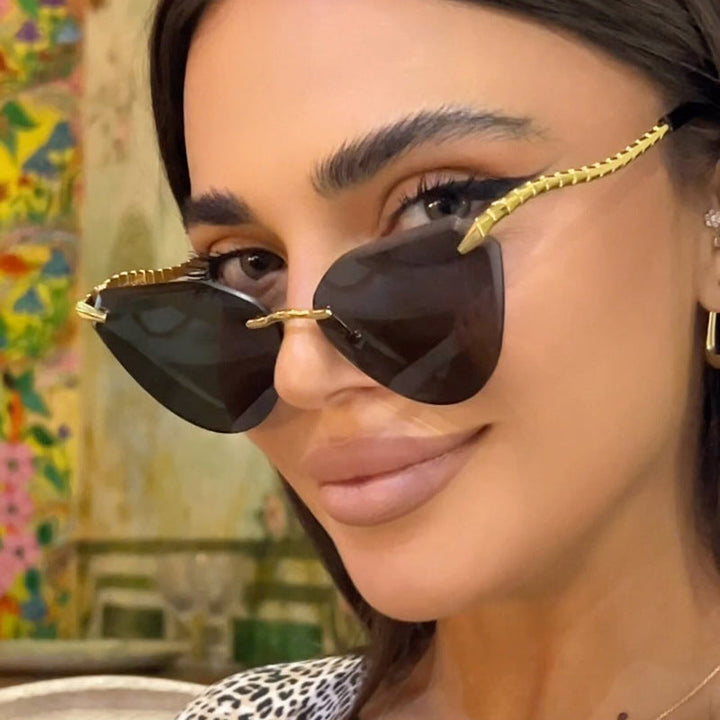 Women's Cat-Eye Sunglasses with unique gold frame design and protective lenses Kalsten