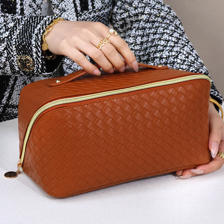 Cosmetic transport bag made of high-quality braided synthetic leather with practical zipper and carrying handle Kalsten