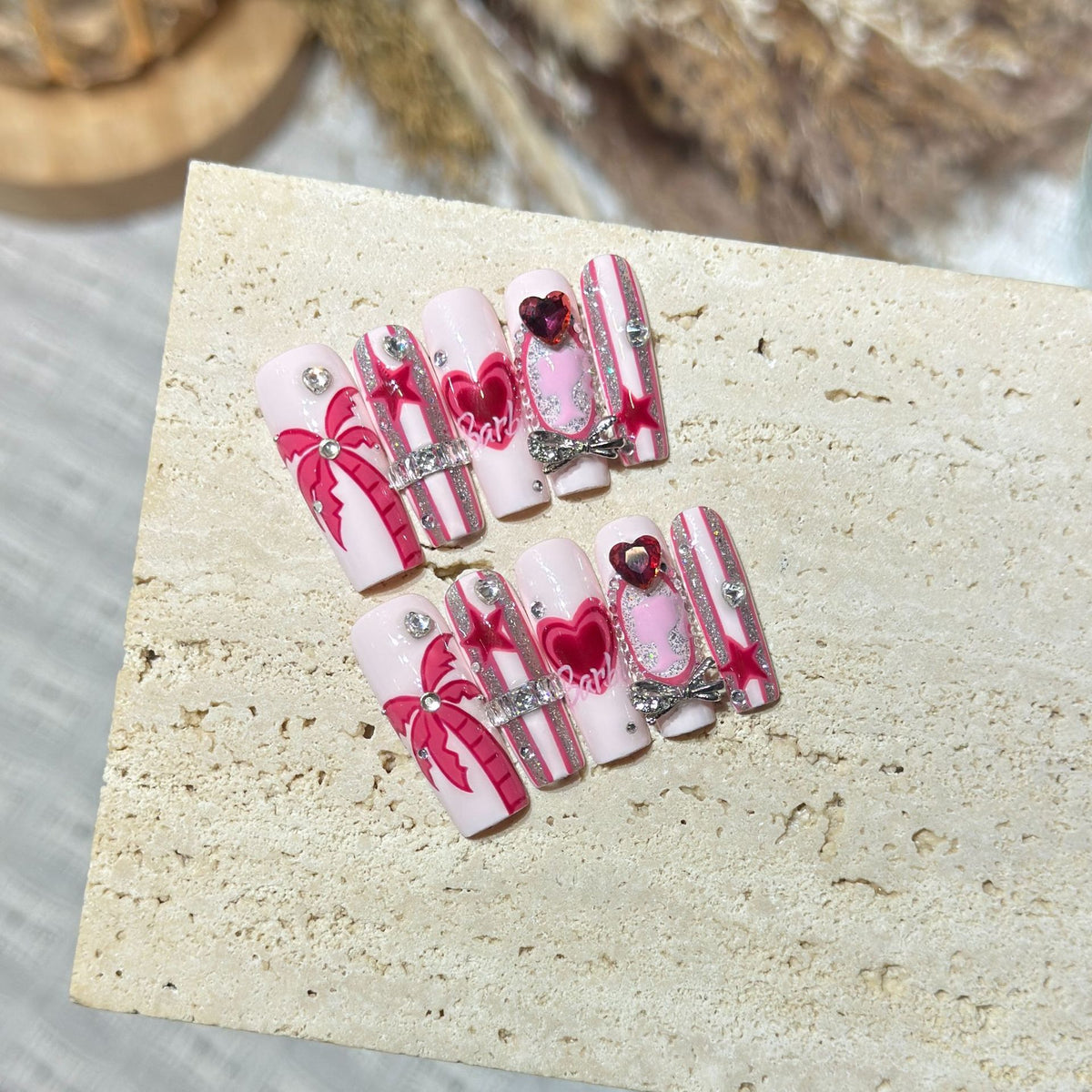 Artistic Press-On Nail Set with Playful Heart and Palm Designs Acalora