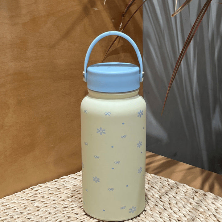 Women's insulated drinking bottle with practical carrying handle and cheerful design Kalsten
