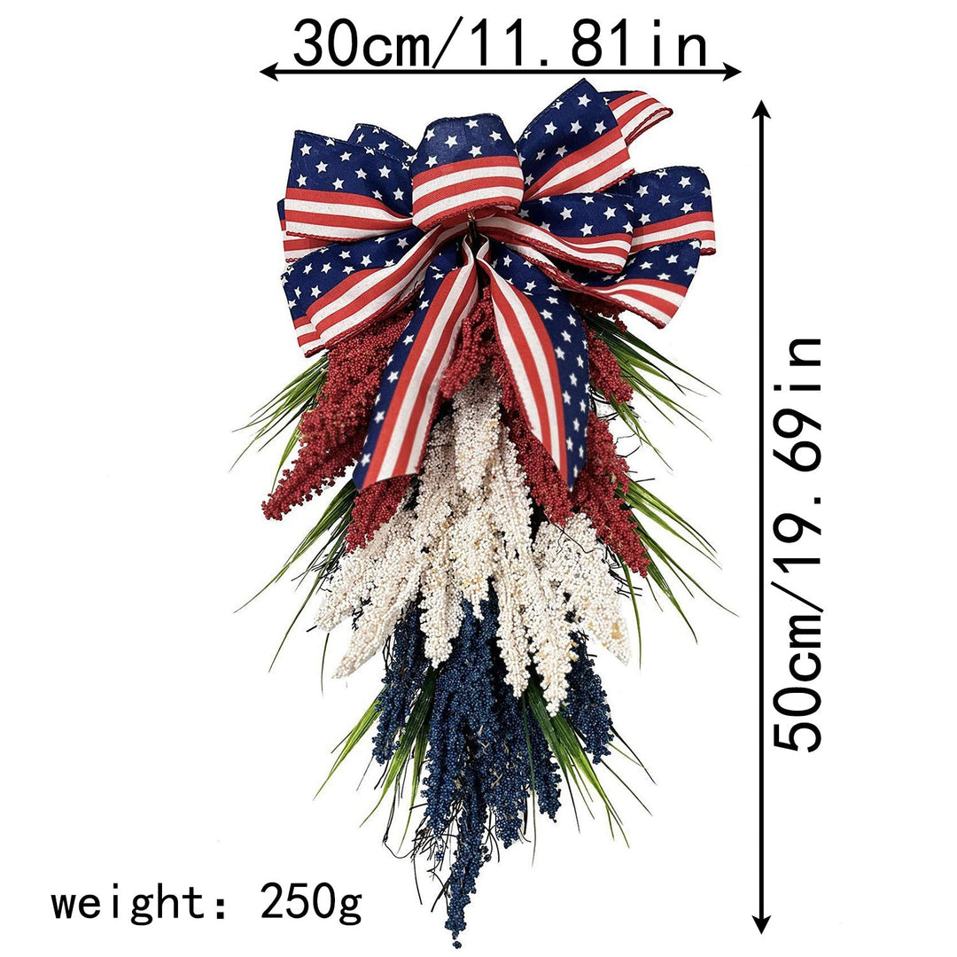 Unisex hanging floral swag with large bow and artificial berry branches Kalsten