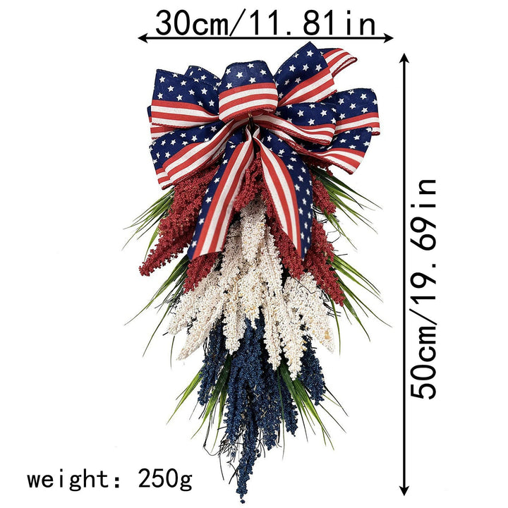 Unisex hanging floral swag with large bow and artificial berry branches Kalsten