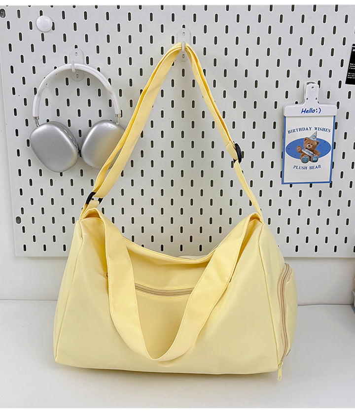 Sporty shoulder bag with spacious interior and sturdy carrying strap Kalsten